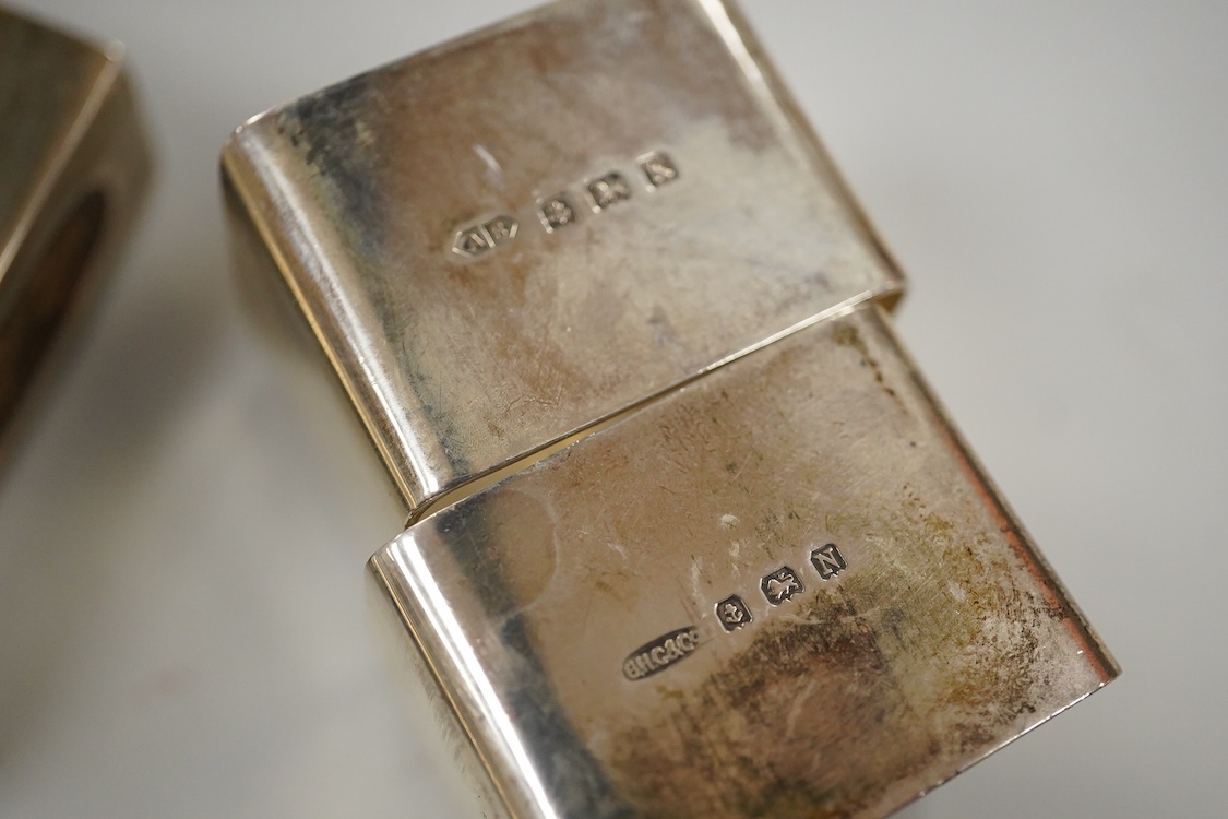 Sundry small silver, including two cigarette cases, a match sleeve holder, three napkin rings, two condiments, matchbox sleeve, shaving brush canister, commemorative small dish, a mounted hand mirror and mounted handbag